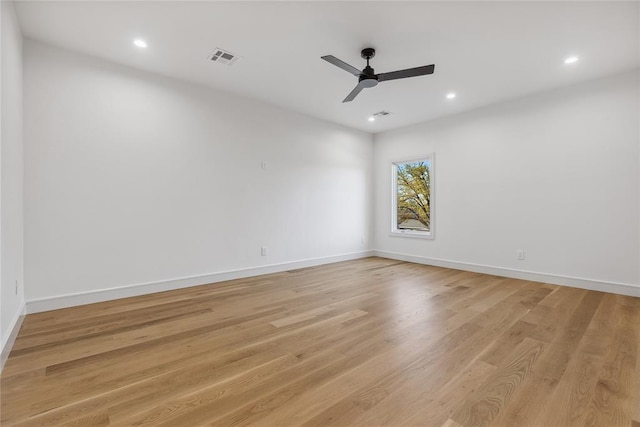 unfurnished room featuring ceiling fan and light hardwood / wood-style flooring