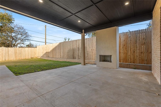 view of patio / terrace with a fireplace