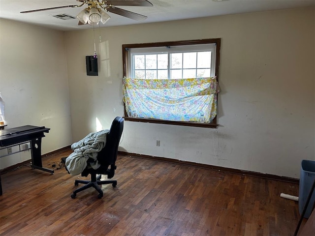 office area featuring ceiling fan and dark wood-type flooring