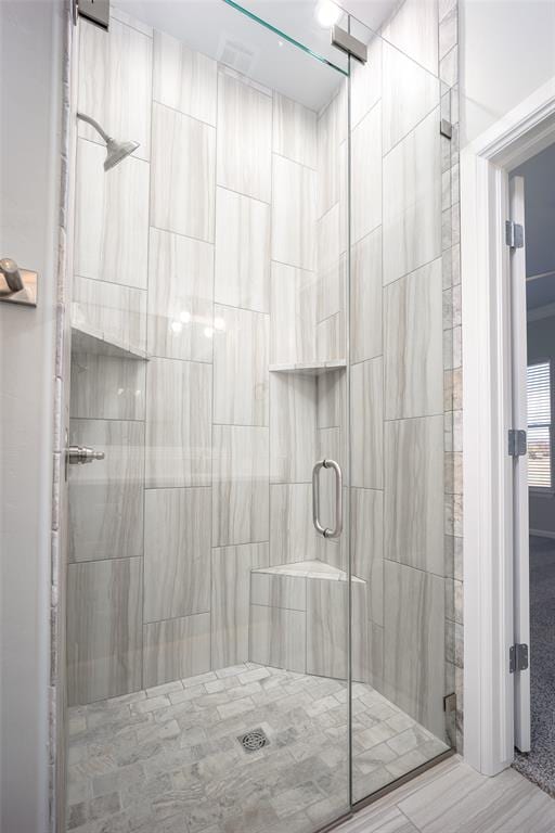 bathroom featuring walk in shower