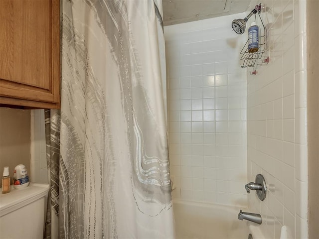 bathroom featuring toilet and shower / bathtub combination with curtain