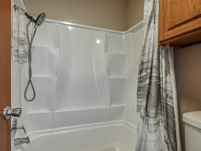 bathroom featuring shower / bathtub combination with curtain