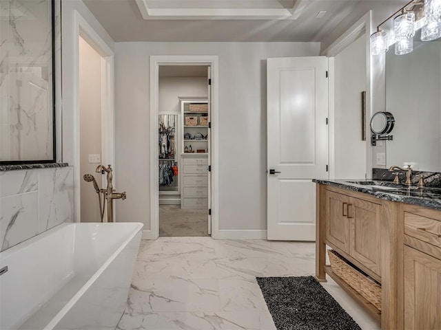 bathroom with vanity and a bathing tub