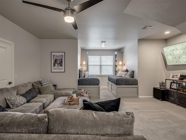 carpeted bedroom with ceiling fan