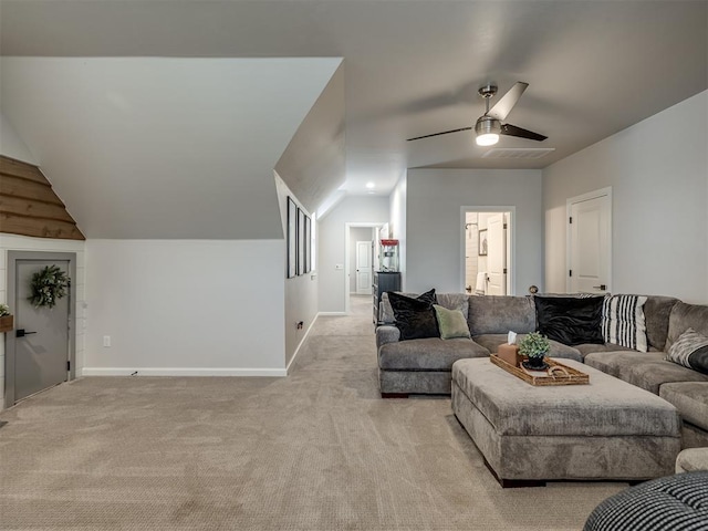 living room featuring ceiling fan, light carpet, and vaulted ceiling