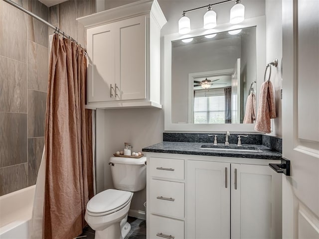 full bathroom featuring ceiling fan, toilet, vanity, and shower / tub combo with curtain