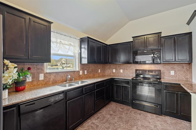 kitchen with black appliances, backsplash, lofted ceiling, and sink