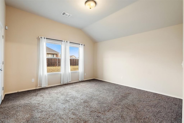 interior space featuring carpet floors and lofted ceiling