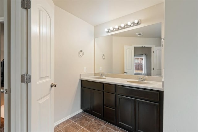 bathroom featuring vanity and tile patterned floors