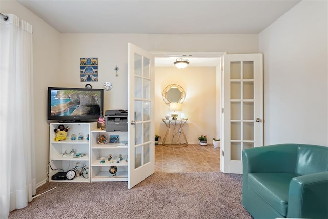 living area with carpet flooring and french doors