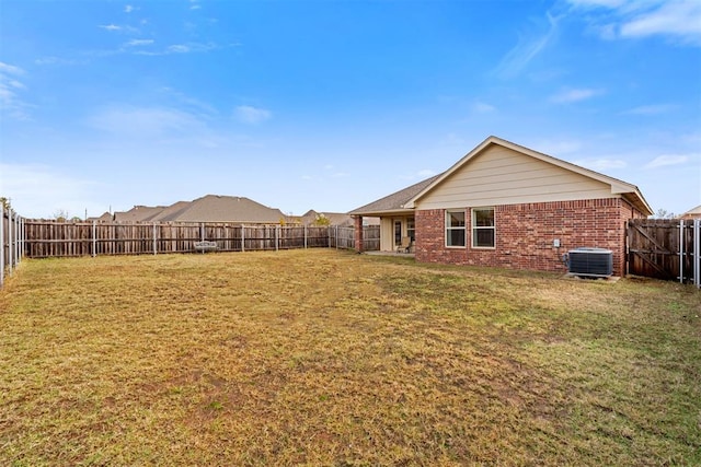 view of yard with central AC