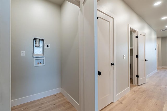 hall featuring light wood-type flooring