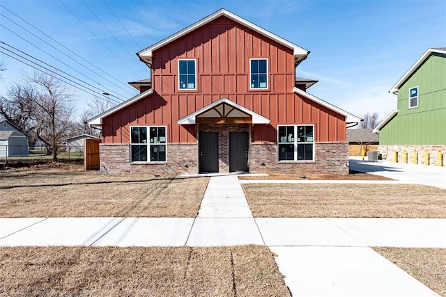 view of front of house featuring cooling unit