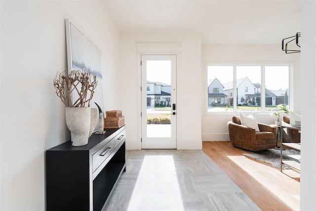 doorway to outside with hardwood / wood-style floors