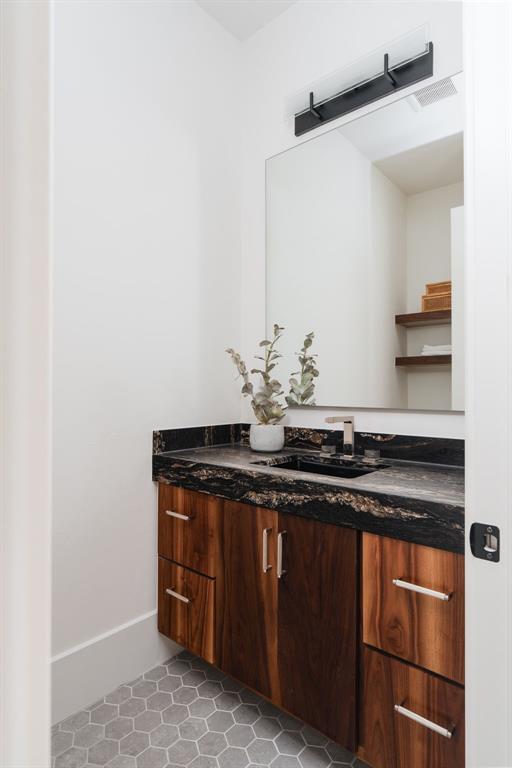 bathroom featuring vanity and tile patterned floors