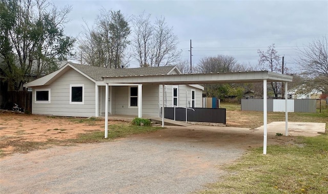 view of front of house featuring a carport