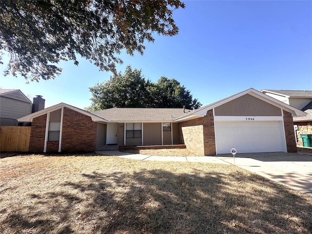 ranch-style house featuring a garage