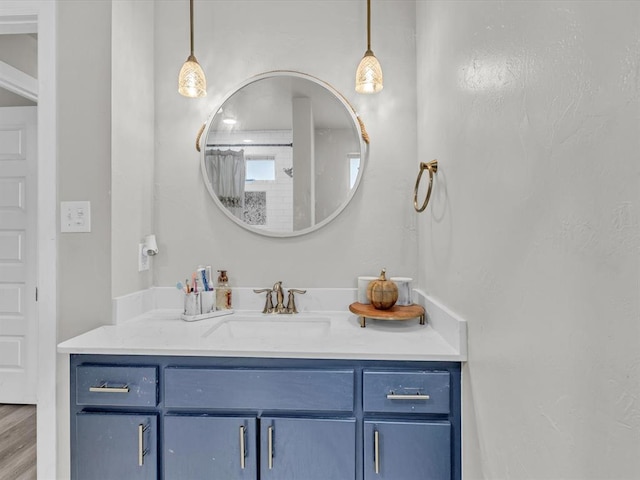 bathroom with a shower with curtain and vanity