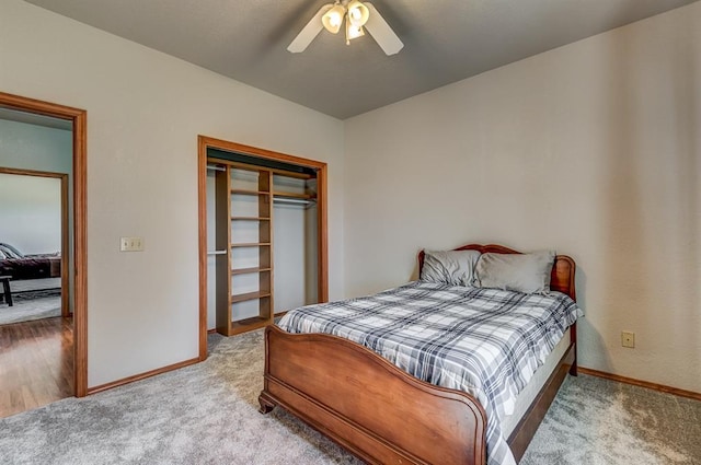 bedroom featuring carpet, ceiling fan, and a closet