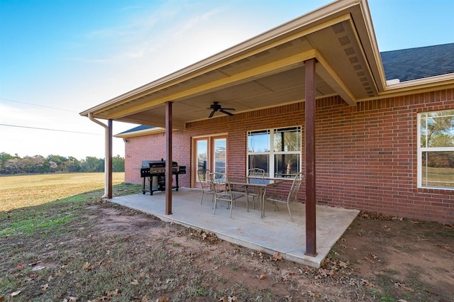 view of patio with grilling area and ceiling fan