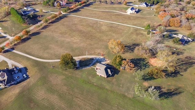 bird's eye view featuring a rural view and a water view