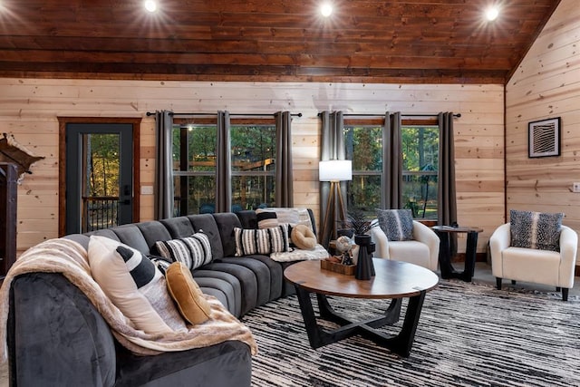 living room featuring lofted ceiling, wood ceiling, and wood walls