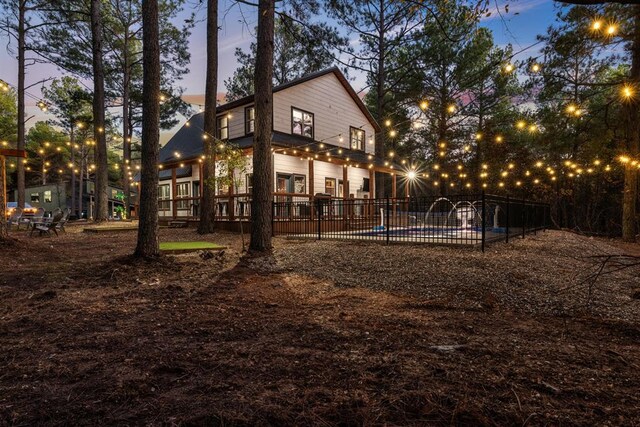 105 Triton Trl, Broken Bow, OK 74728 - rear view of house with a patio