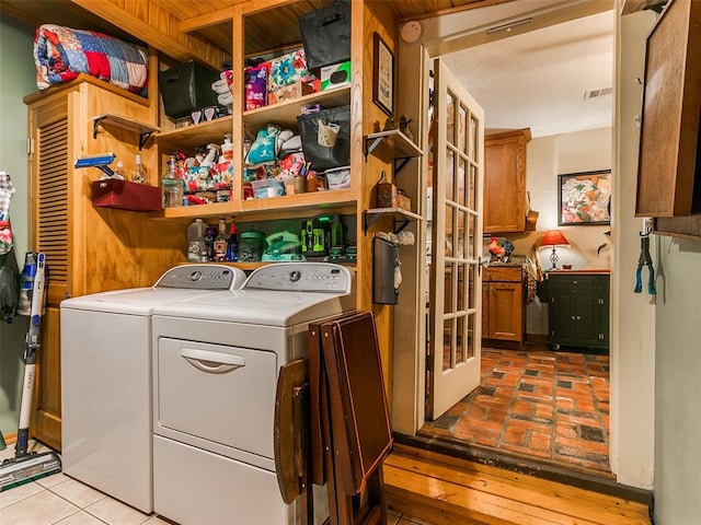 washroom with washer and clothes dryer