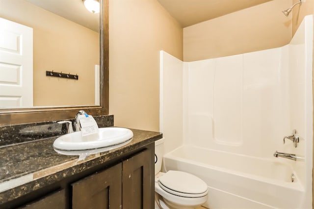 full bathroom with shower / bathing tub combination, vanity, and toilet