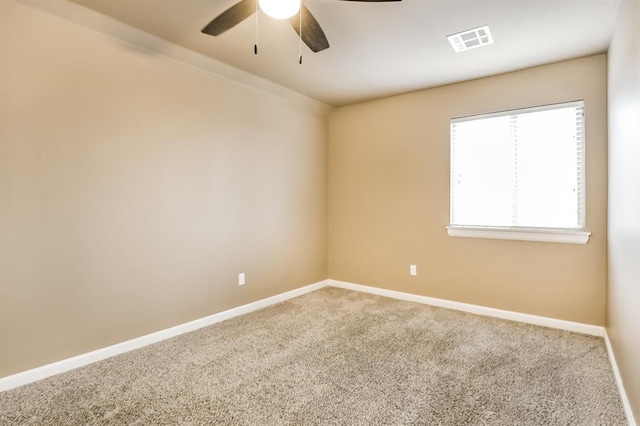 unfurnished room with carpet floors and ceiling fan