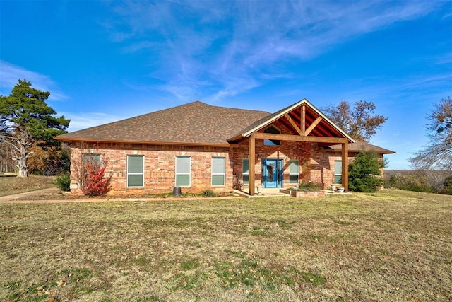 view of front of property with a front lawn