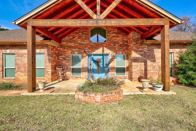 exterior space with a yard and a patio