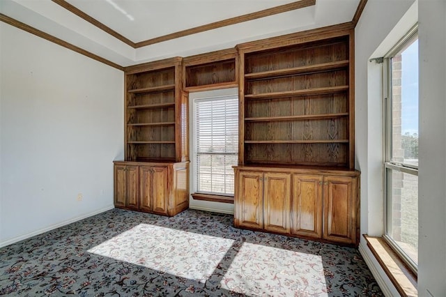 unfurnished living room with carpet flooring and ornamental molding