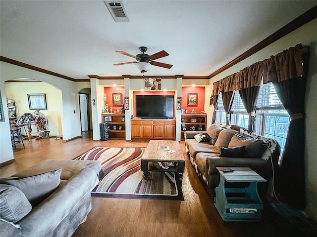 living room featuring crown molding, hardwood / wood-style floors, and ceiling fan