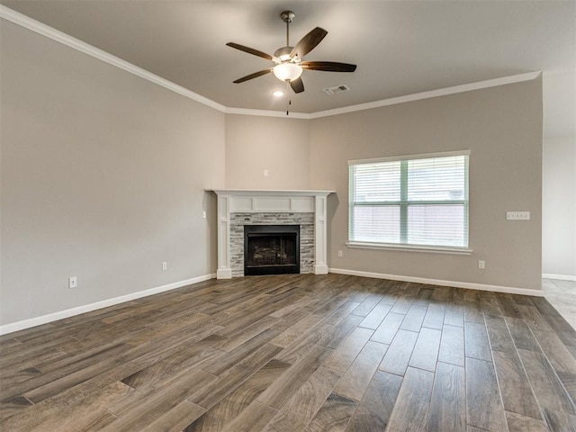 2213 Waterbrook Ct, Norman, OK 73026 - unfurnished living room with a ceiling fan, dark wood-type flooring, crown molding, baseboards, and a fireplace