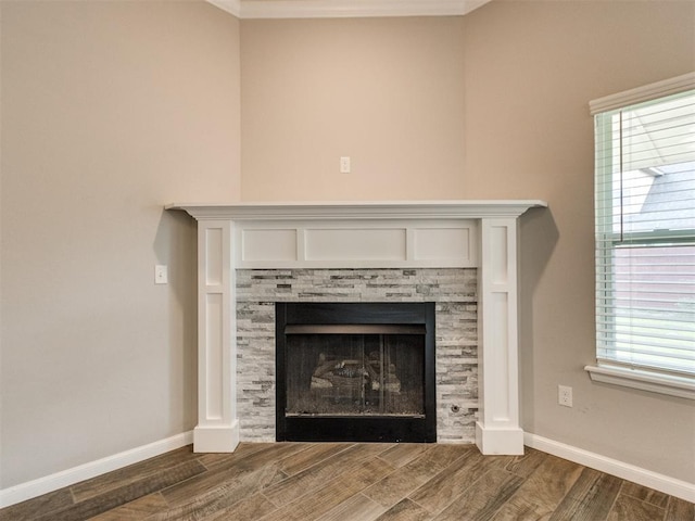 2213 Waterbrook Ct, Norman, OK 73026 - detailed view of wood finished floors, a fireplace, baseboards, and ornamental molding