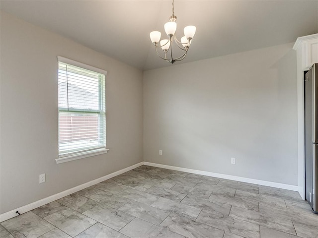 2213 Waterbrook Ct, Norman, OK 73026 - unfurnished room featuring light marble finish floors, a chandelier, baseboards, and lofted ceiling