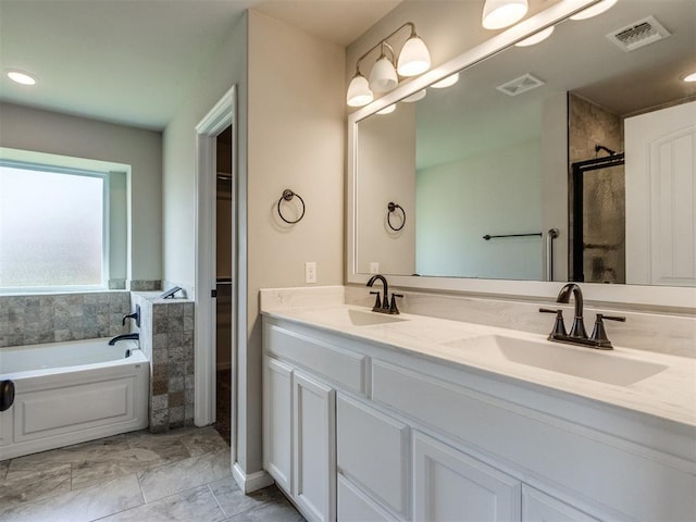 2213 Waterbrook Ct, Norman, OK 73026 - bathroom with a bath, double vanity, and a shower with door