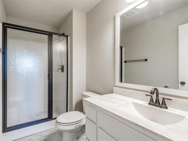 2213 Waterbrook Ct, Norman, OK 73026 - full bath featuring a shower stall, toilet, and vanity