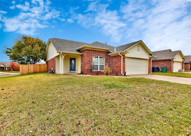 ranch-style home featuring a garage and a front lawn