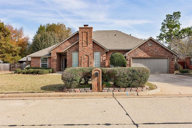 ranch-style home featuring a garage