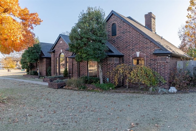 view of home's exterior featuring a lawn