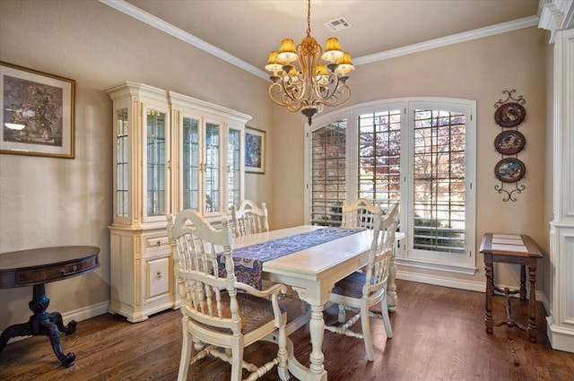 dining space featuring a notable chandelier, crown molding, and dark wood-type flooring