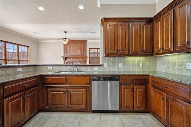 kitchen featuring ceiling fan, sink, stainless steel dishwasher, and light stone counters