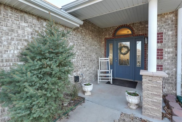 property entrance featuring covered porch