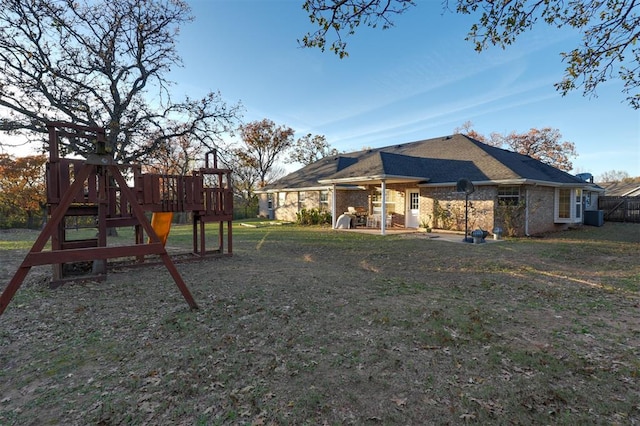 exterior space with a playground and central AC