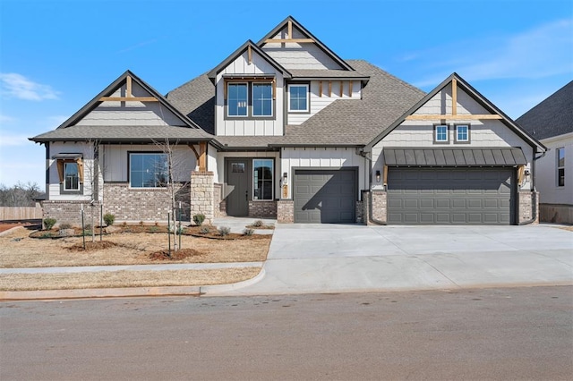 craftsman-style home featuring brick siding, board and batten siding, concrete driveway, and a shingled roof