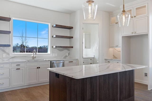 417 Basin Way, Norman, OK 73069 - kitchen with open shelves, a sink, wood finished floors, and light stone countertops