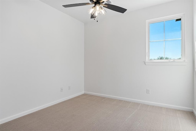 417 Basin Way, Norman, OK 73069 - empty room with a ceiling fan, baseboards, and light carpet
