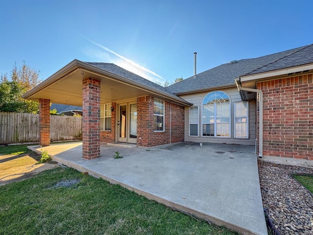 back of property with a patio area